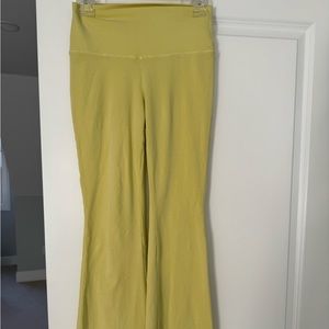 Aritzia yellow flare leggings, size small, never worn